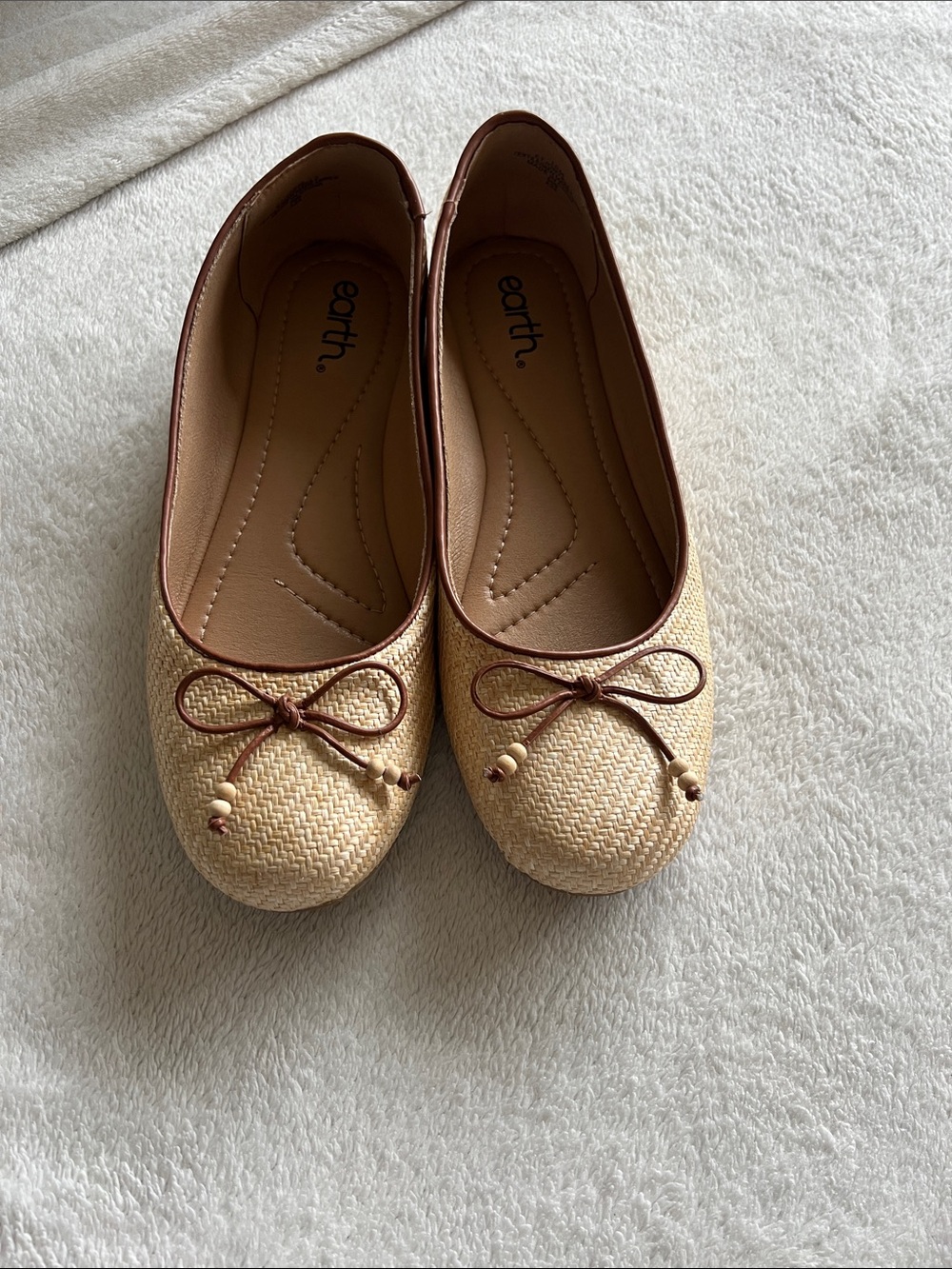 Earth Natural Straw Ballet Flats with Brown Trim and Bow Accents
